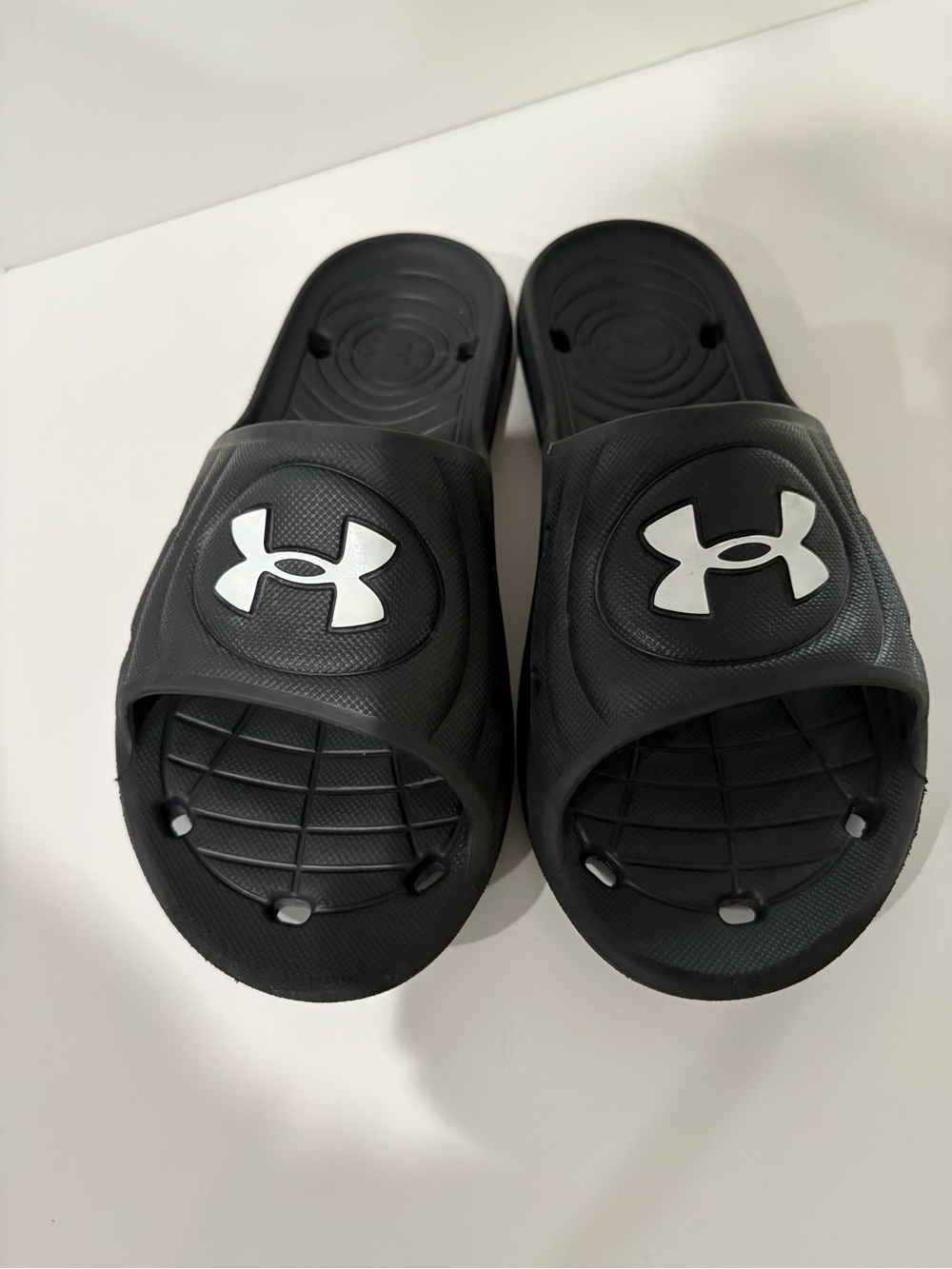 Under Armour Black Slides with White Logo Accents